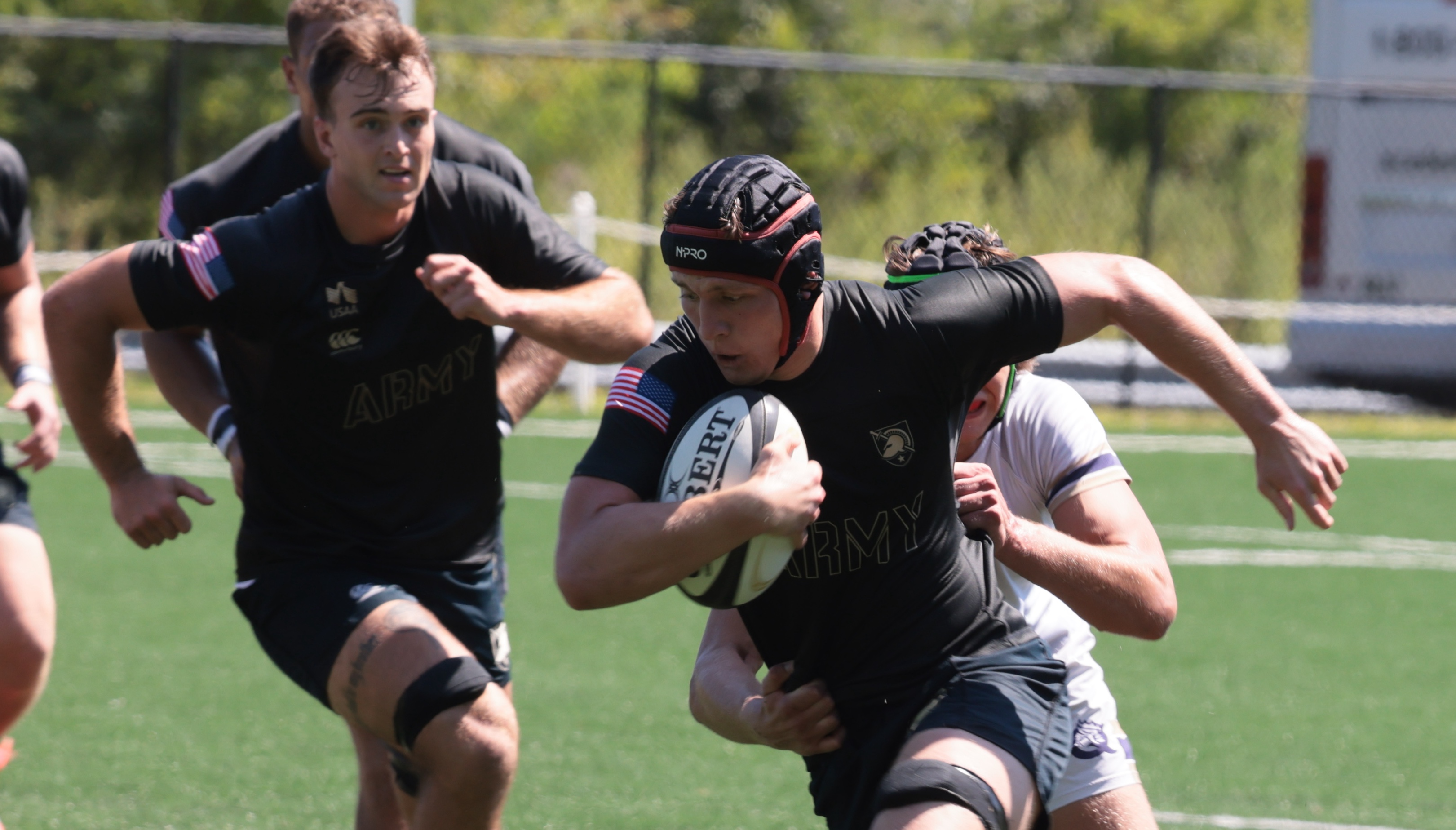 Max Doerfler takes the ball up for Army against Queens. Photo Walter Schmidlin.
