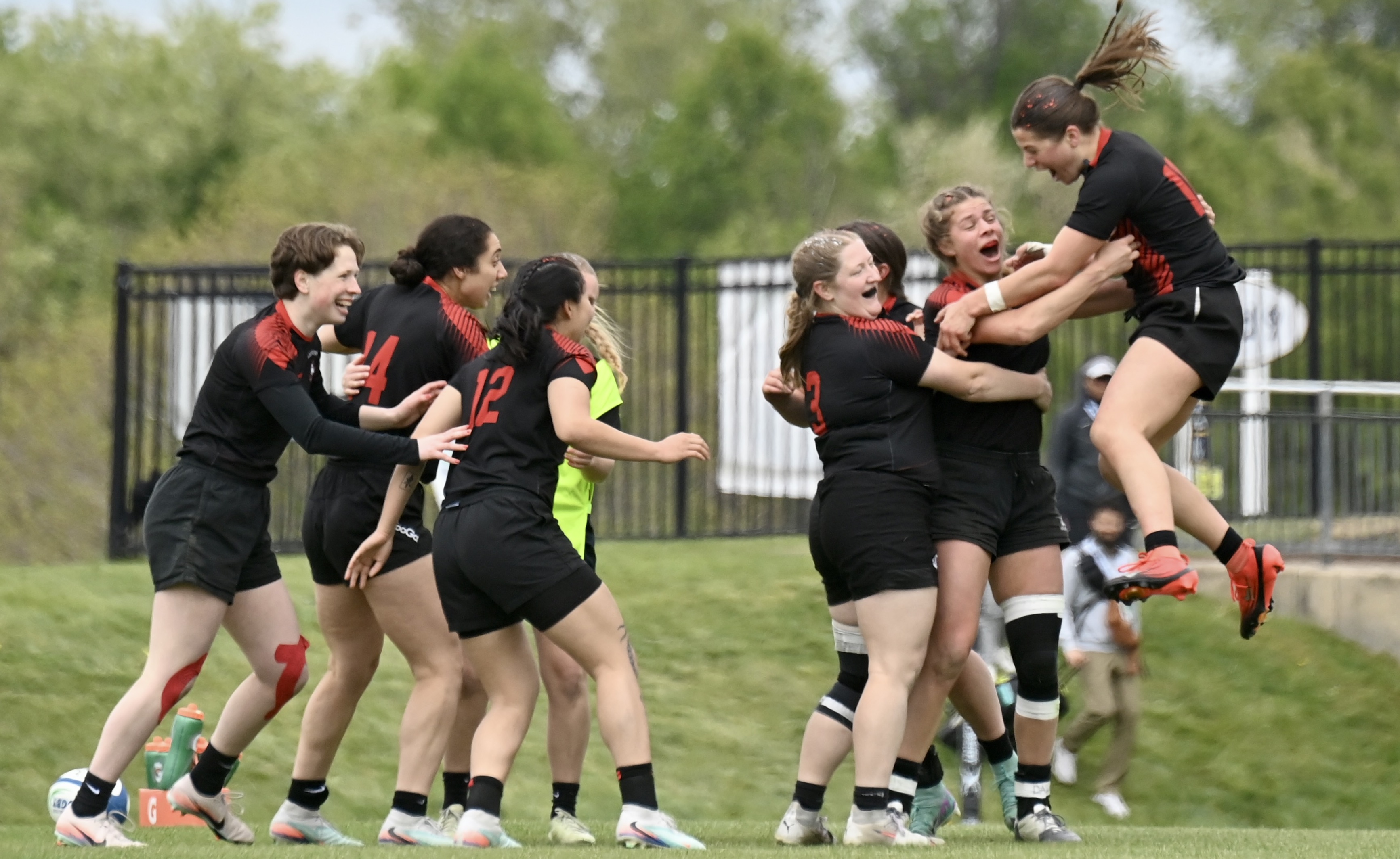 Northeastern celebrates winning the D1AA bracket at the 2026 CRC. Photo @CoolRugbyPhotos.
