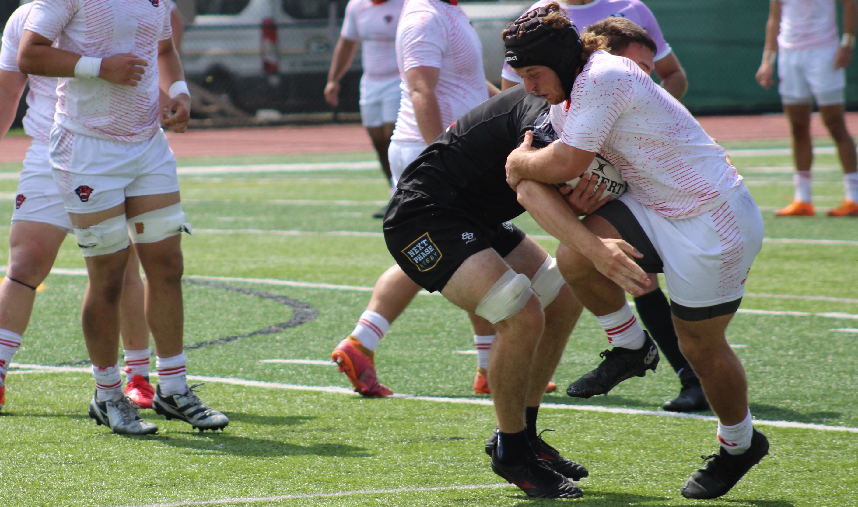 Jack Snidanko works through a tackle. Photo Alex Goff.