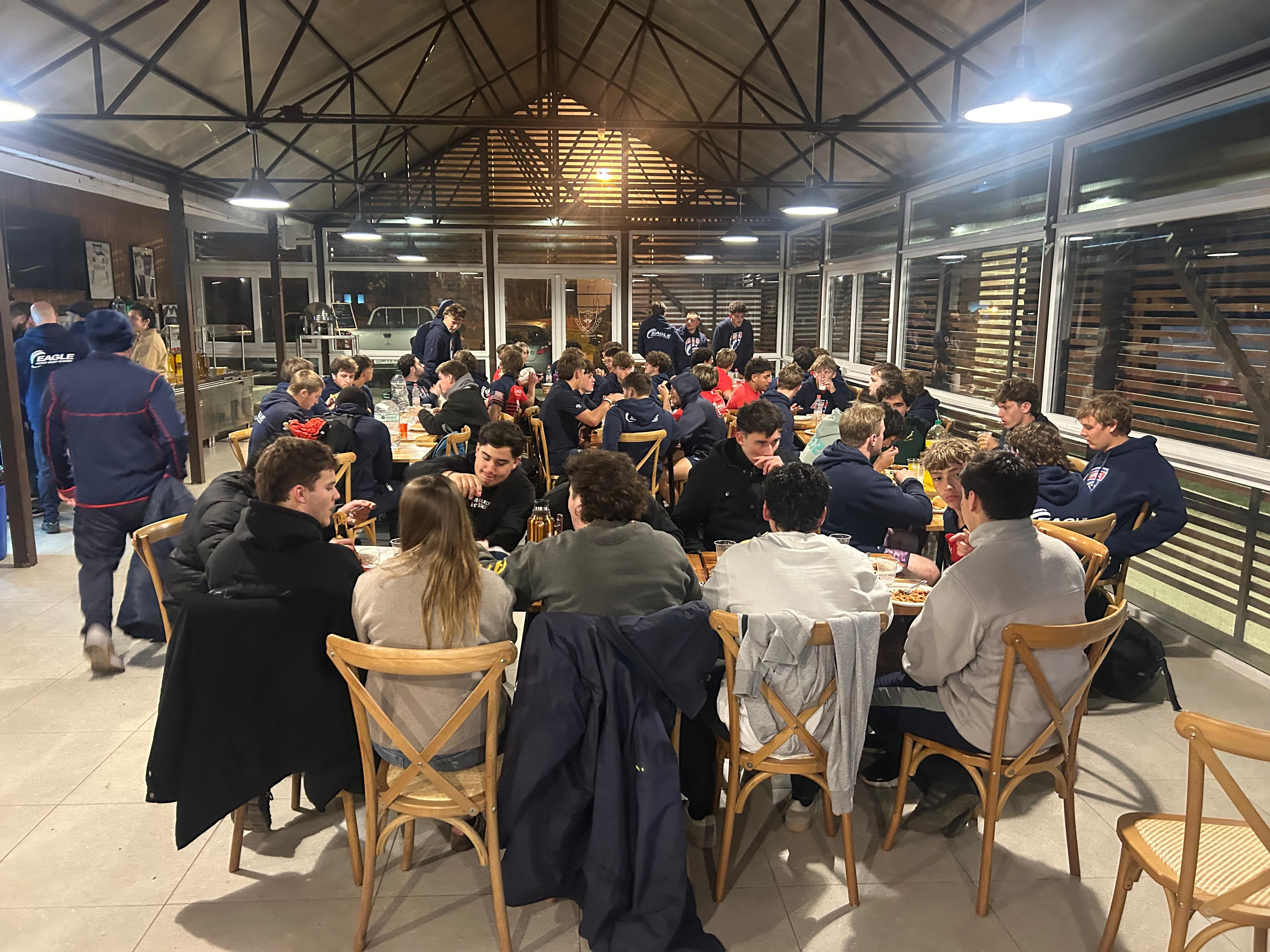 EIRA enjoying their post-match meal.