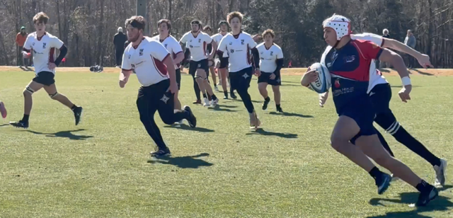 Greer's Martin Sarkees on the attack vs Wando.