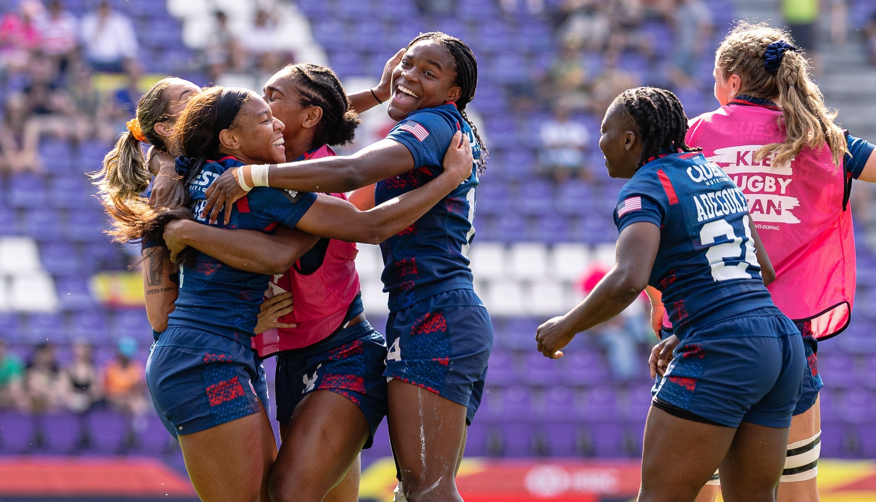 USA players celebrate beating Australia. Photo Alex Ho for World Rugby.