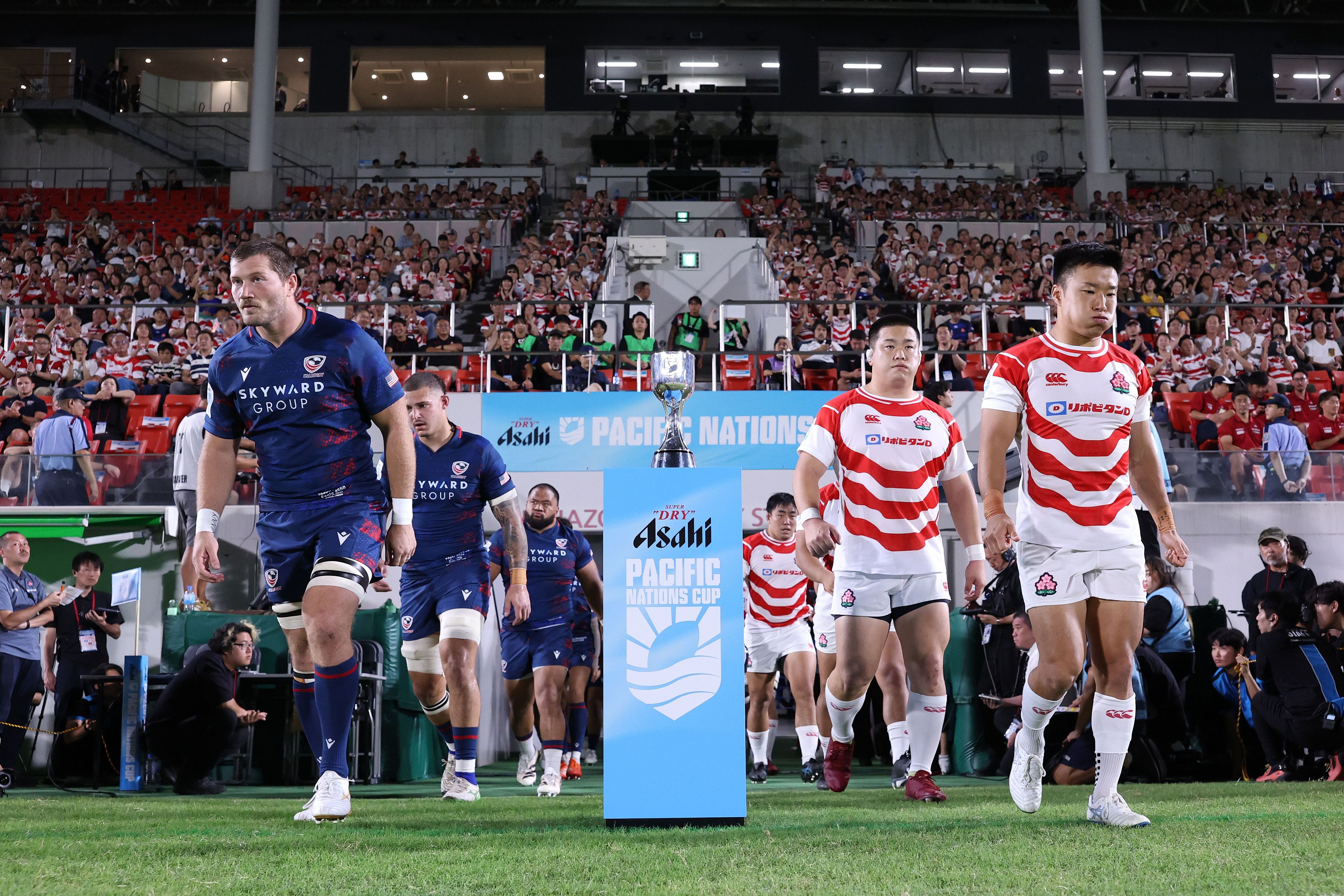 USA and Japan captains led their teams out. Photo Paul Miller - World Rugby via Getty Images.