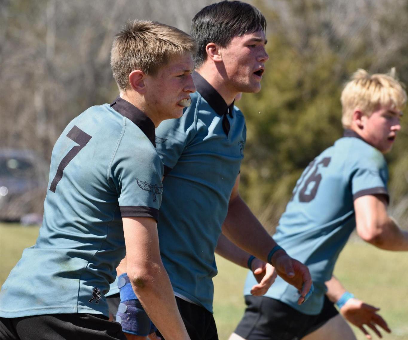 Kingfishers flanker and Captain Peter McDonald, prop Henry Schafer, and lock Liam Kelly.