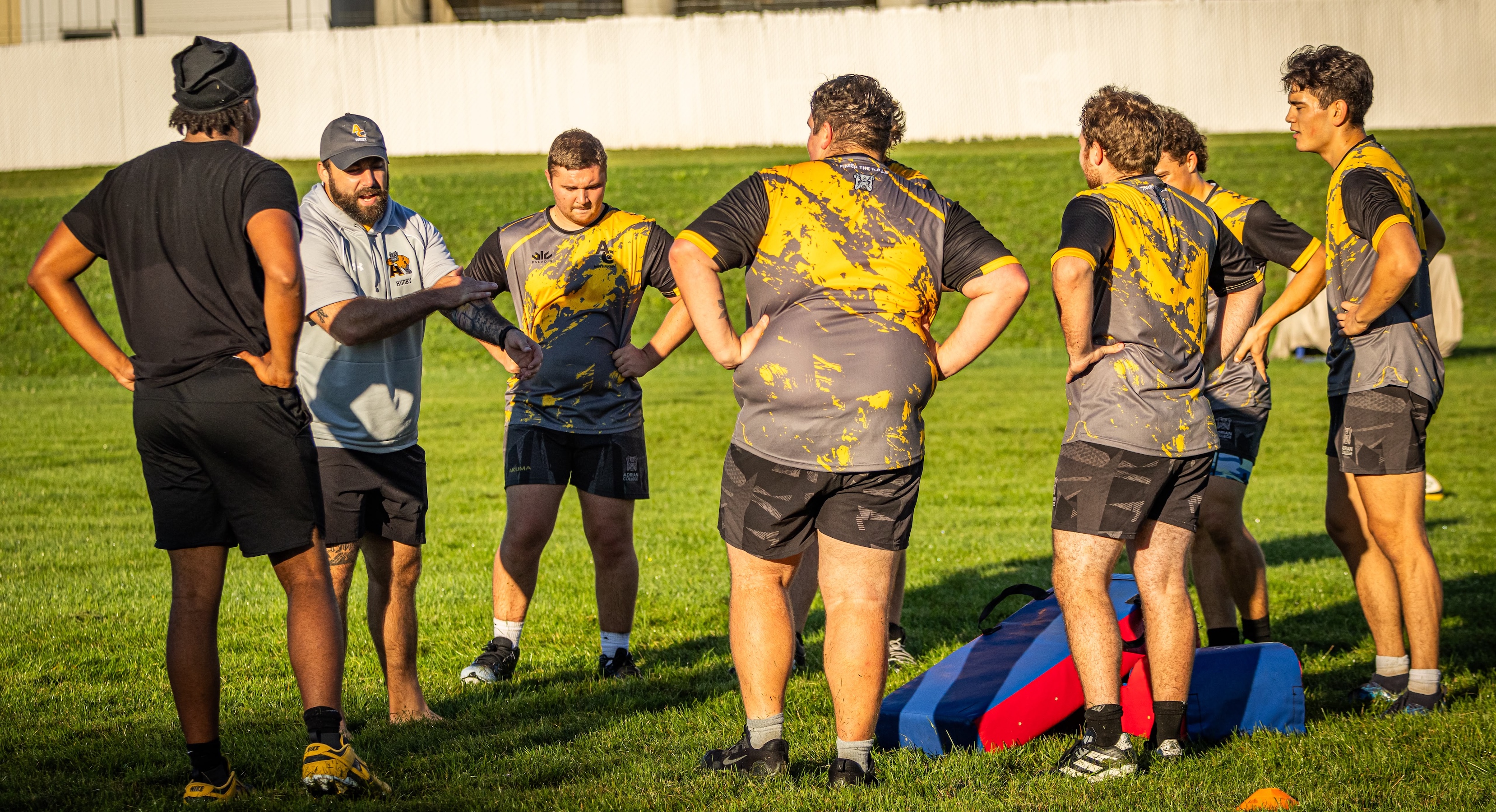 Sam Chaney goes over the basics with his players. Photo Lexi Kotz.