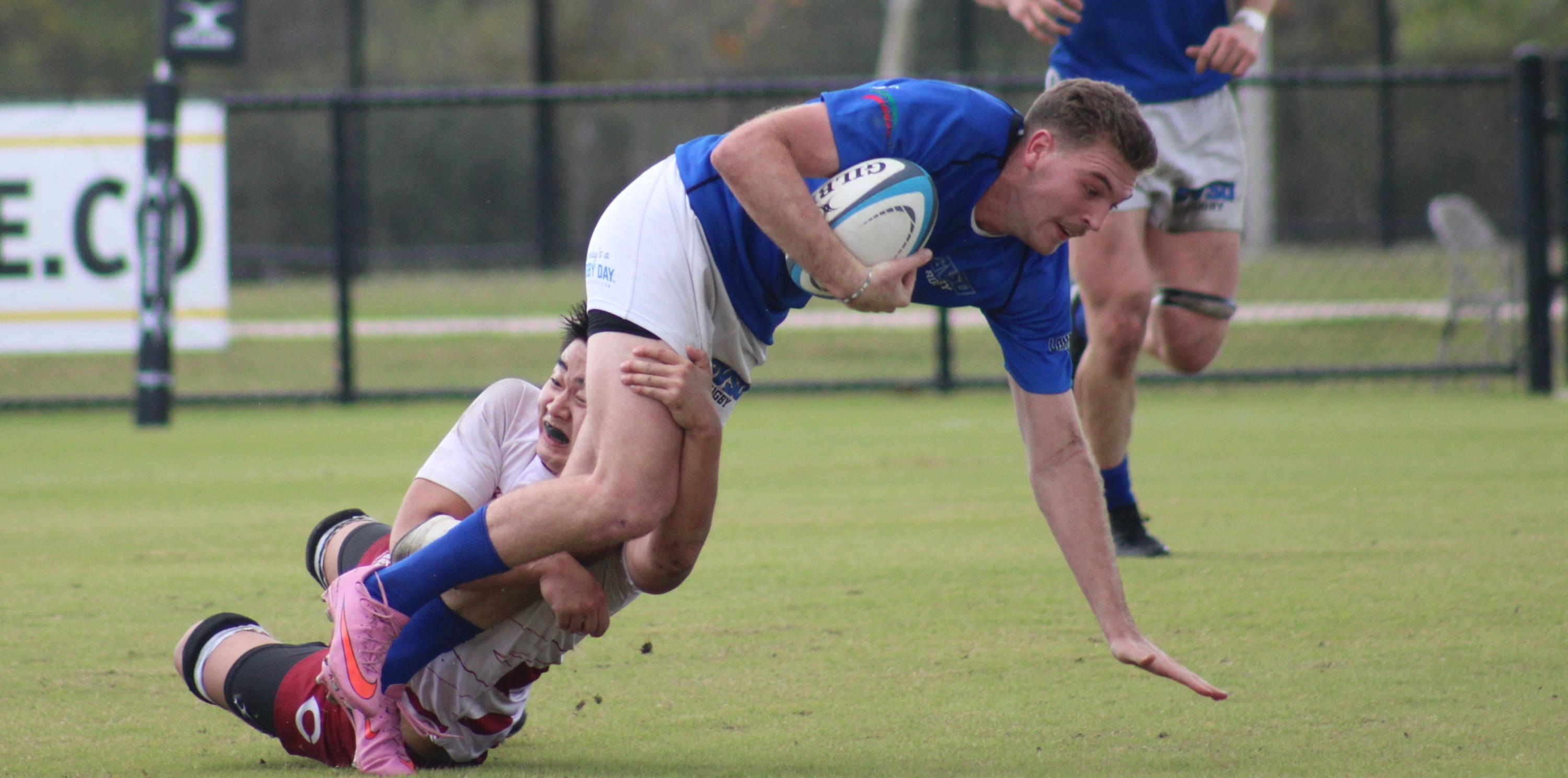Grand Valley State vs U Chicago contact in the 2025 NCR D2 semifinals. Photo Alex Goff.