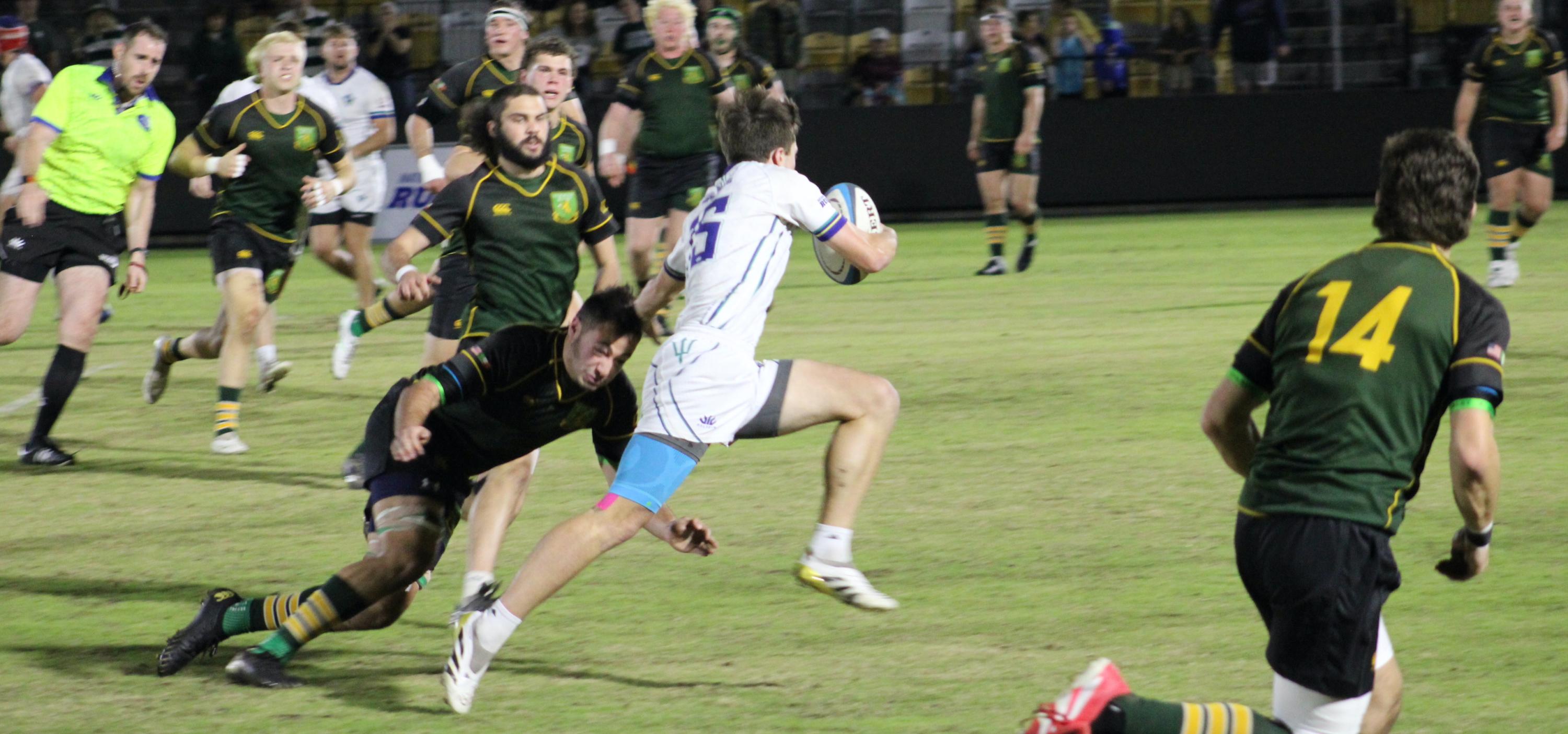 UNC Wilmington in white vs UVM in green in the 2025 NCR D2 semifinal. Photo Alex Goff.
