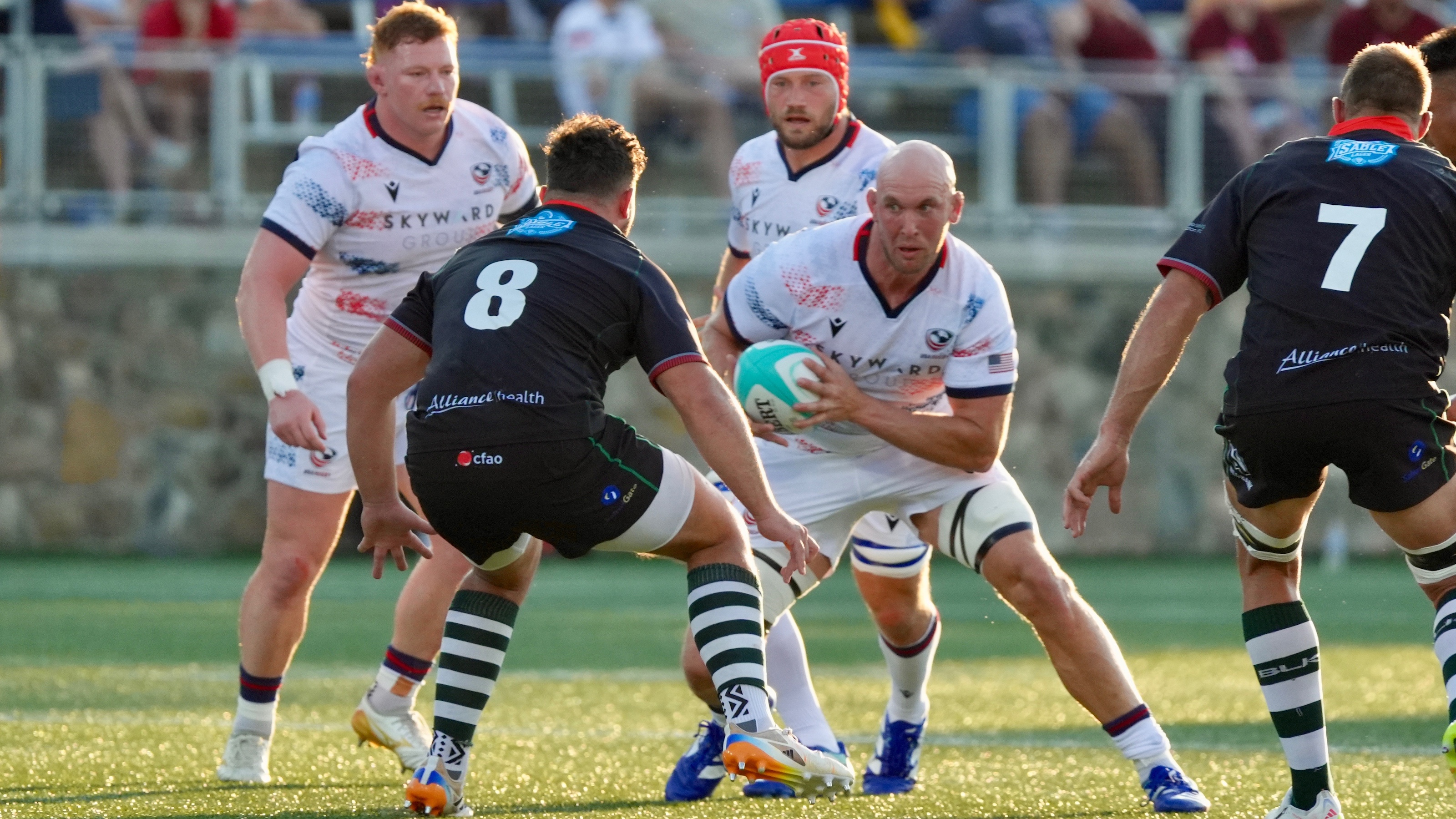 Nathan Den Hoedt with Jason Damm and Jack Iscaro in support vs Zimbabwe. Greg Sabin photo.