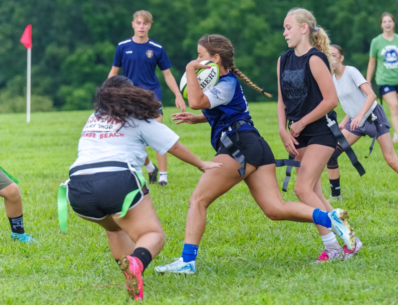 Warhounds kids play flag rugby during the summer.