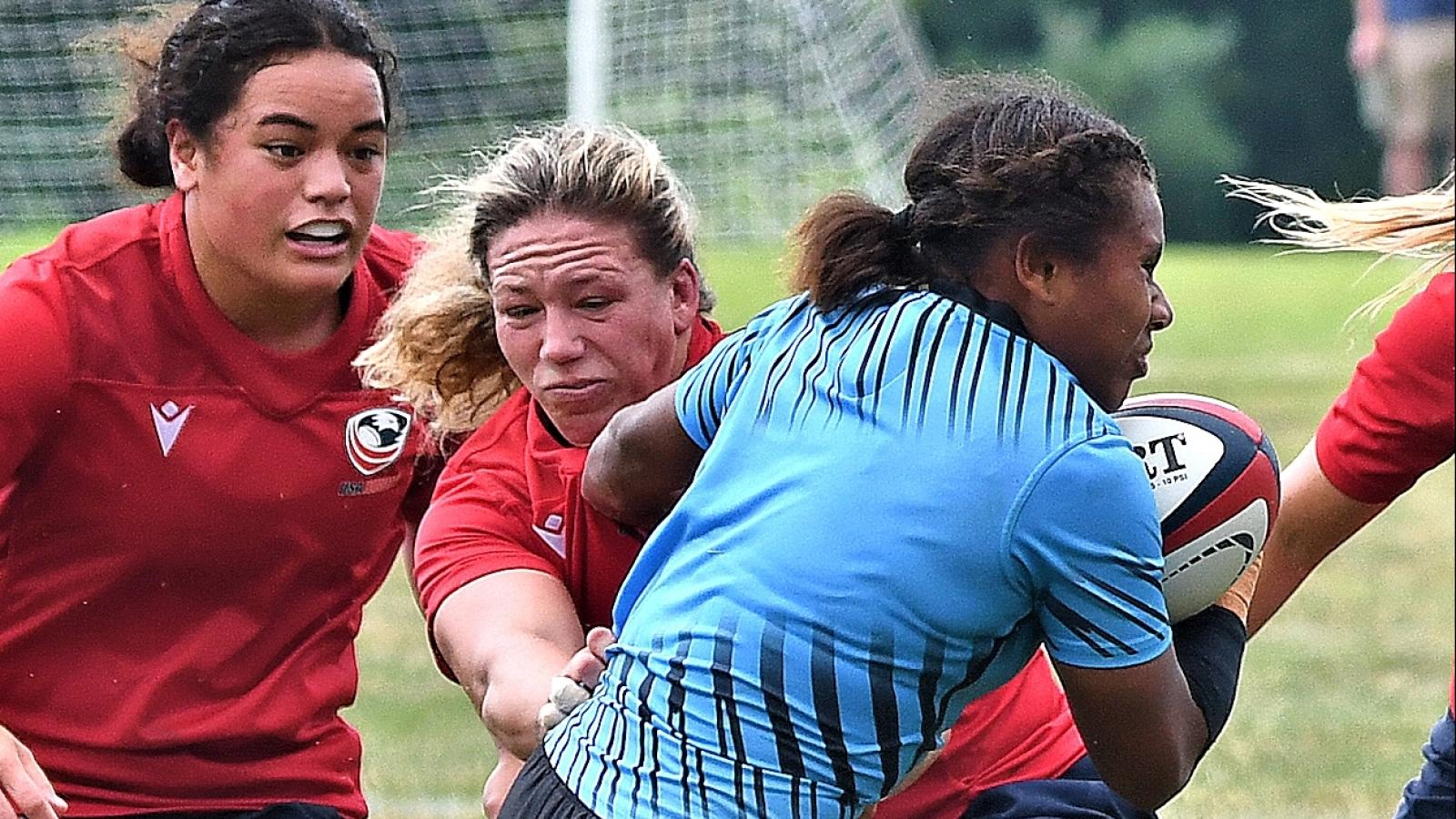 Hope Rogers makes a tackle in a USA scrimmage vs Fiji in 2025. Fred Tafuna is in support.. Photo David Hughes.