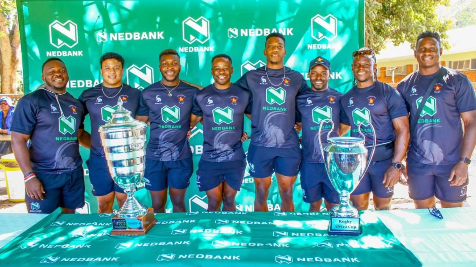 zimbabwe team with trophy
