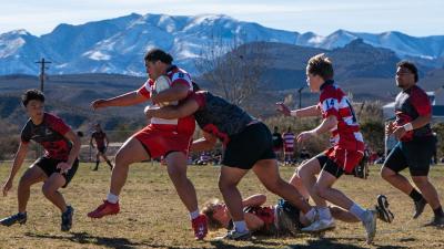 Cavemen makes a tackle against East HS. Photo Maxwell Brent @brentography.