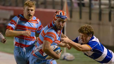 Thomas McKillop powers ahead for Charlotte Catholic. Dan Caple photo.