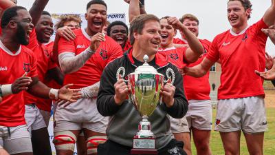 Dominic Shaw hoists the Spartan Regiment Bowl trophy in 2025. Photo Calder Cahill.