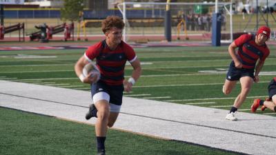 Max Wilson down the sideline. Photo Rick Hales.
