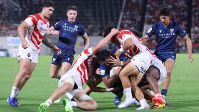 Tavite Lopeti scores for the USA vs Japan. Photo  Paul Miller - World Rugby via Getty Images.