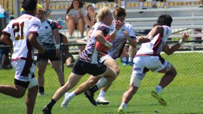 Blake Guthrie goes in for the game-winner for Rebel at the NAI 7s. Photo Alex Goff