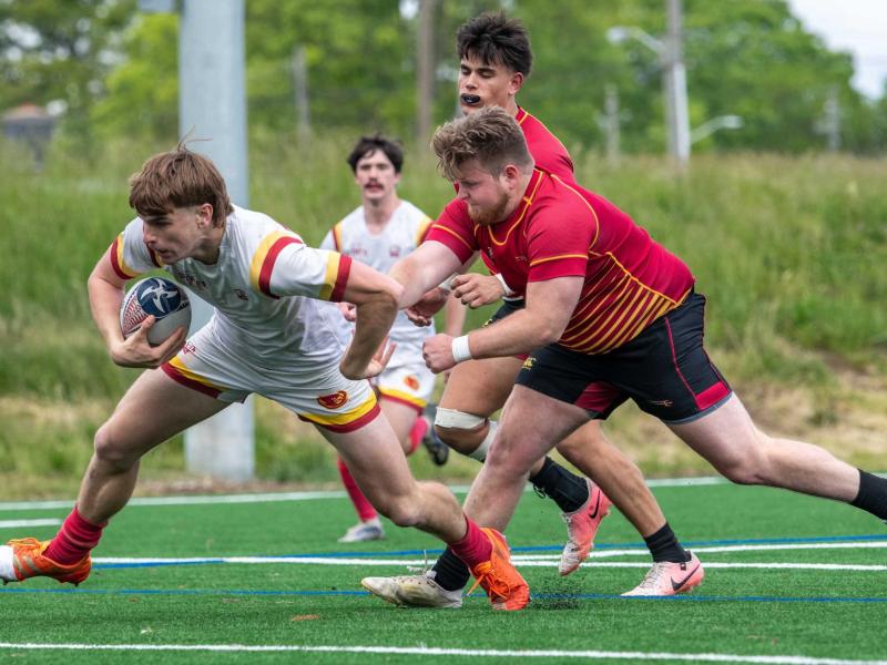 Iowa State, in white, won goes in for another try. Calder Cahill photo.