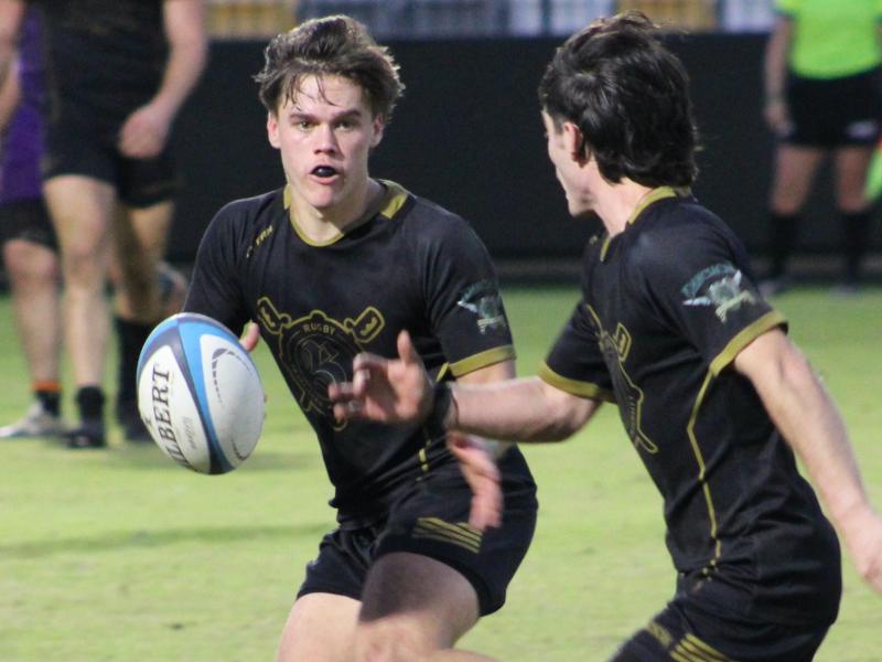 Franciscan moves the ball against Holy Cross. Photo Alex Goff.