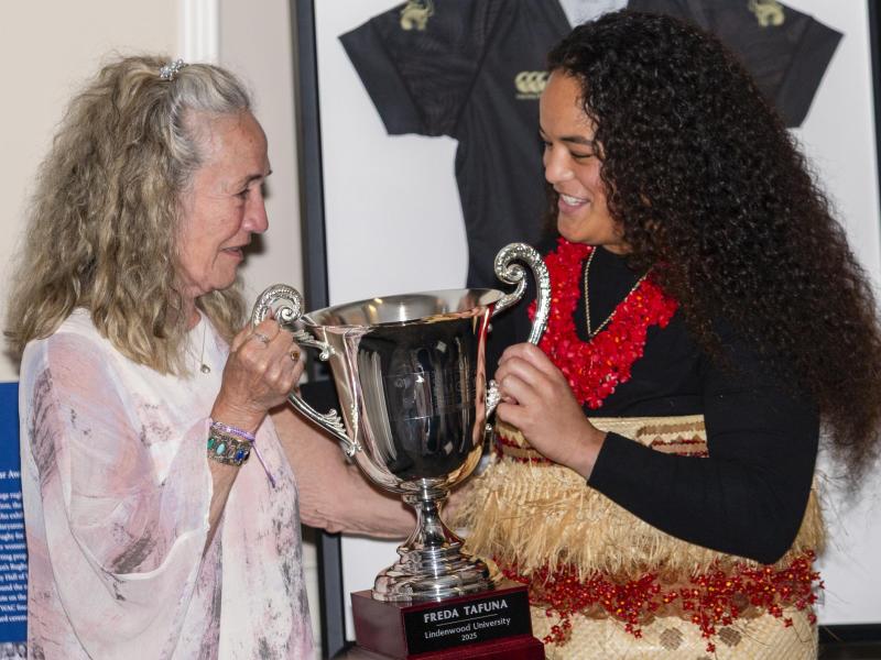 MA Sorensen presents the award named after her to Freda Tafuna at the 2025 WAC Awards dinner in Seattle, Wash. Photo Quinn Toomey.