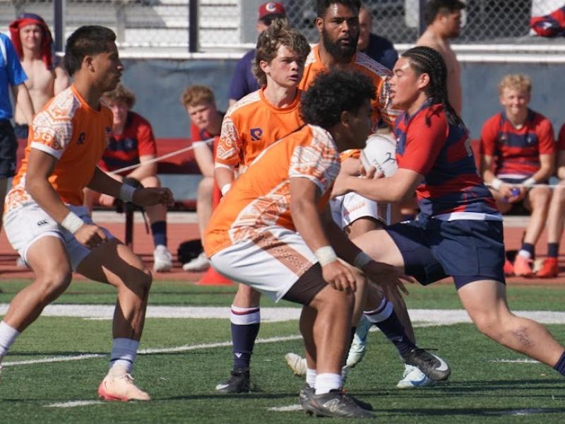 Lauaki Su'a carries ahead for Herriman. Photo Rick Hales.