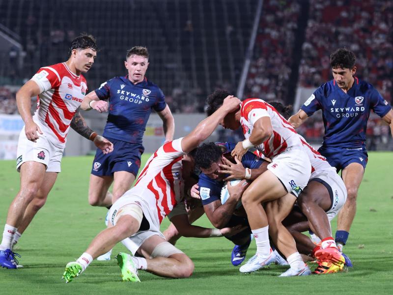 Tavite Lopeti scores for the USA vs Japan. Photo  Paul Miller - World Rugby via Getty Images.