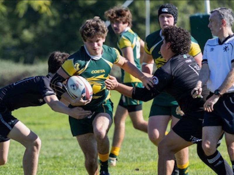 Parker Spiegel charges ahead for Mira Costa. Photo Alexis Poelman.