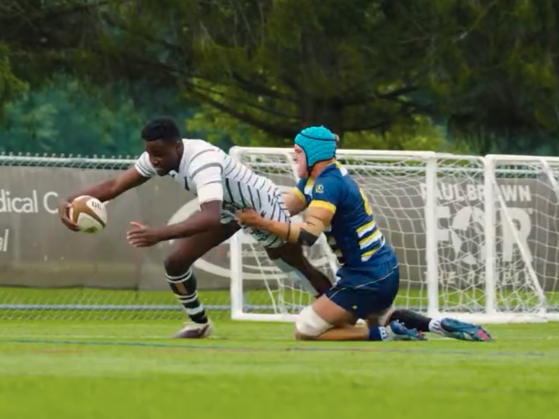 Bonnies wing Dara Falope goes in for a try against Marian.