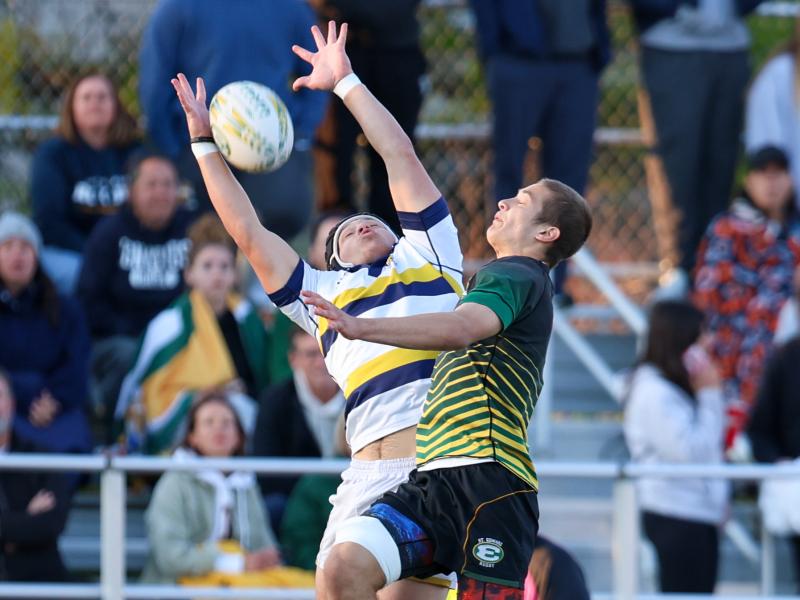 Ed's and Iggy going up for the high ball. Jack Nece photo.