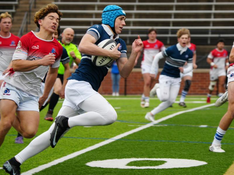 Will Rainey on the run for SLUH.