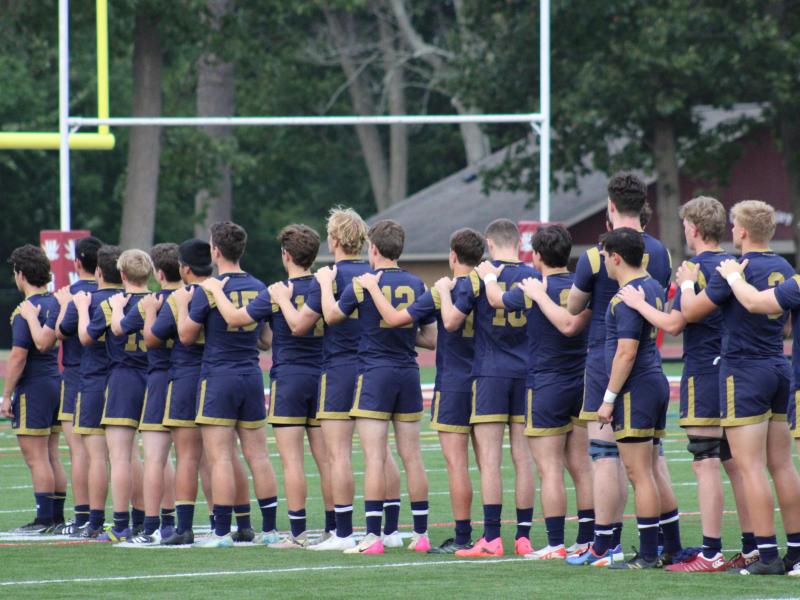 Notre Dame lines up for the anthem. Photo Alex Goff.