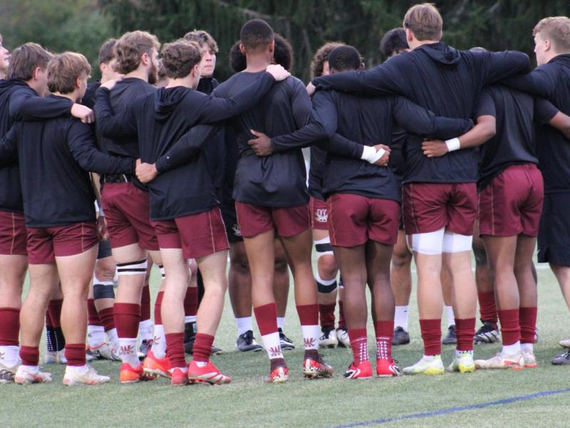 Walsh Huddles up. Alex Goff photo.