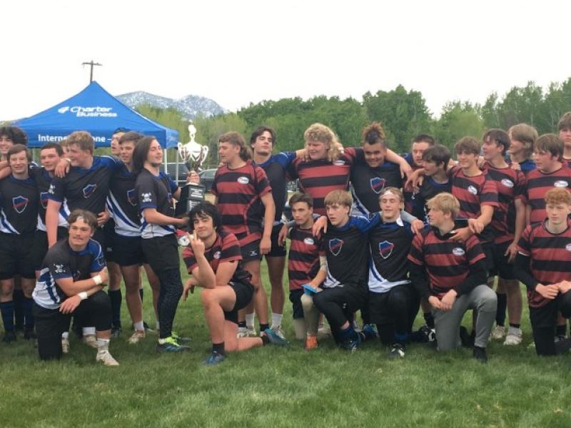 black blue mud dogs after championship game