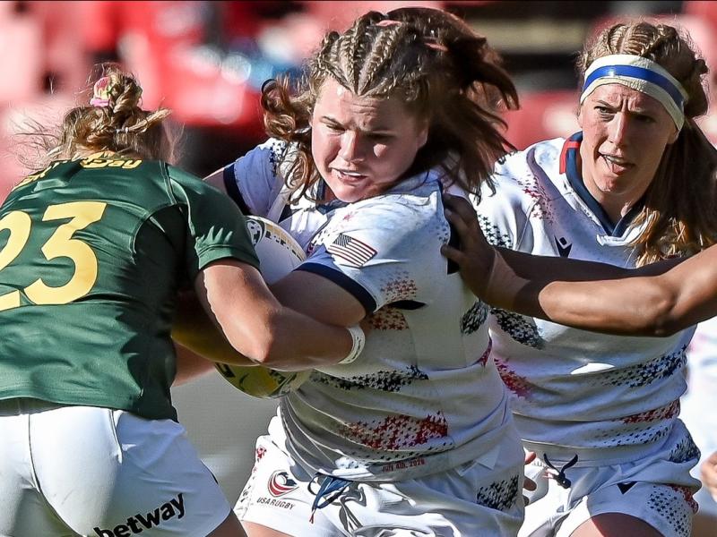Caroline Cook charges on with Georgia Perris-Redding in support.