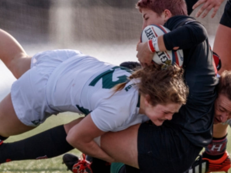 emily henrich makes a tackle