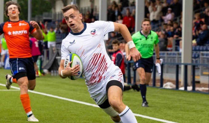 Keelan Farrell on his way to one of his four tries. Photo by Ross Parker / SNS Group