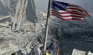 Flag raised at the site of the attacks by rugby-playing firefighters.