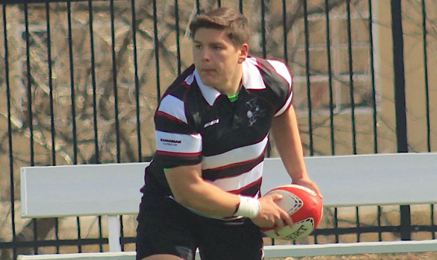 Jacob Ortiz passes the ball out for the Benedictine Black Monks.