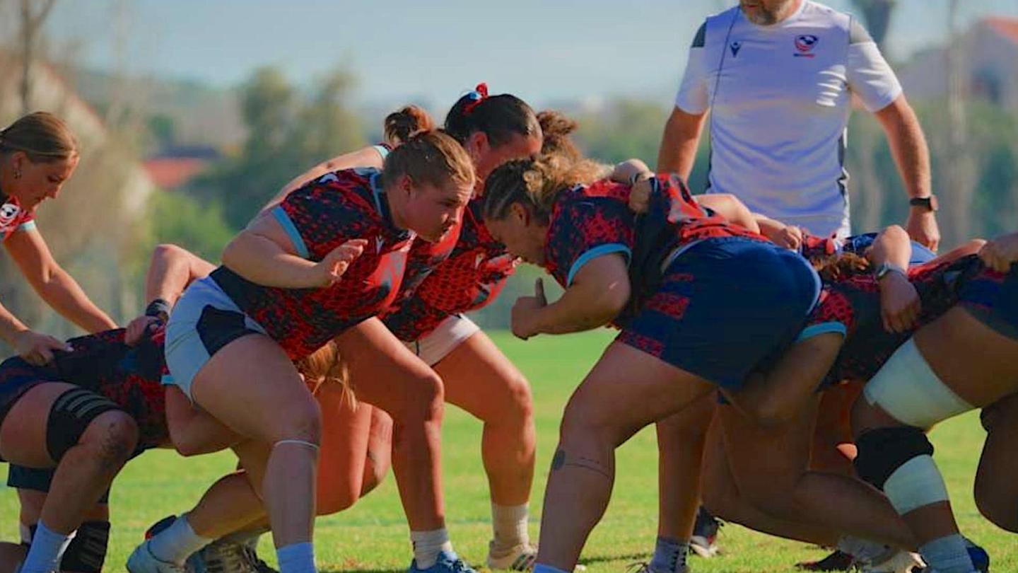 Caroline Cook gets set to pack down against USA legend Hope Rogers.