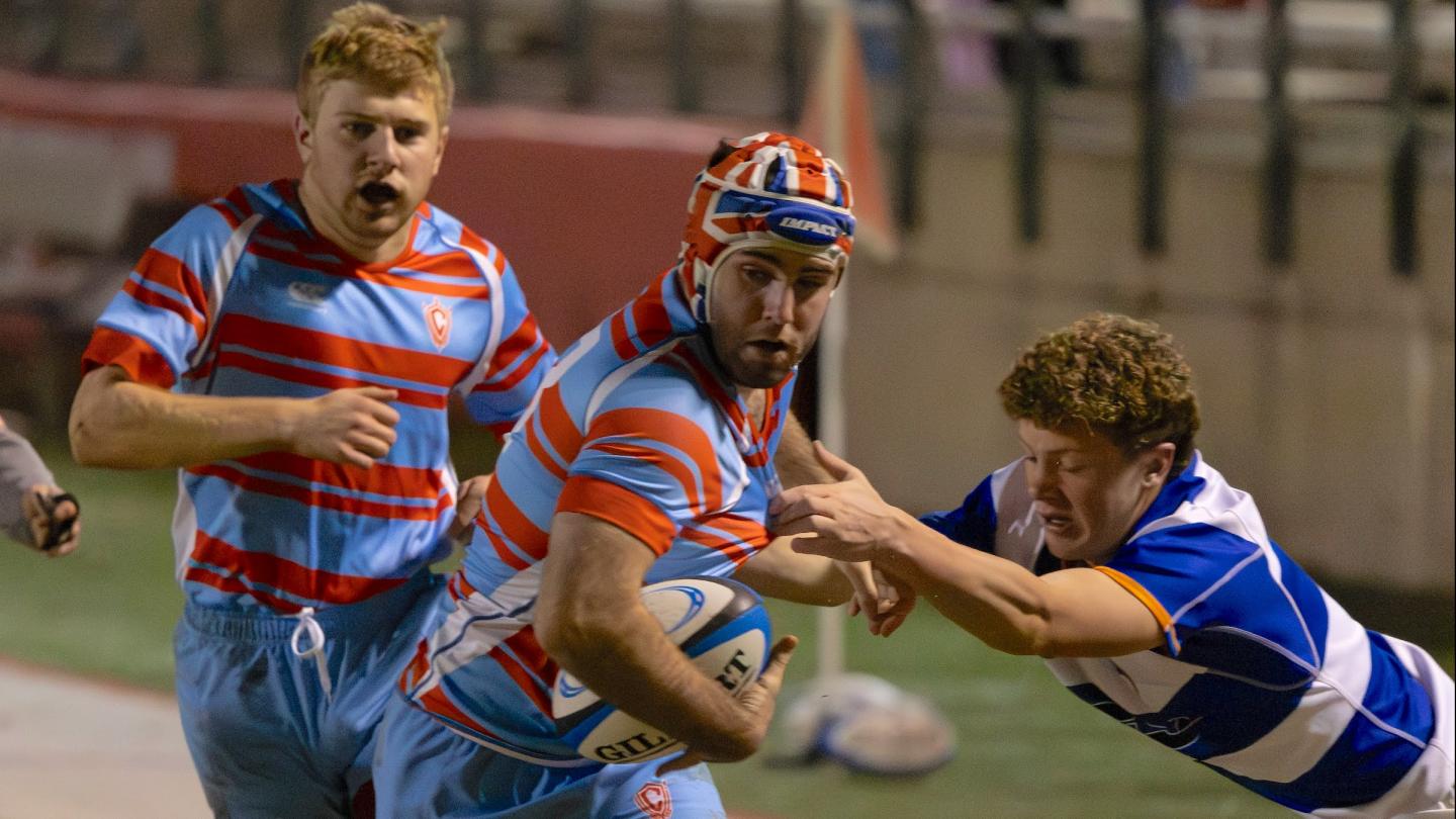Thomas McKillop powers ahead for Charlotte Catholic. Dan Caple photo.