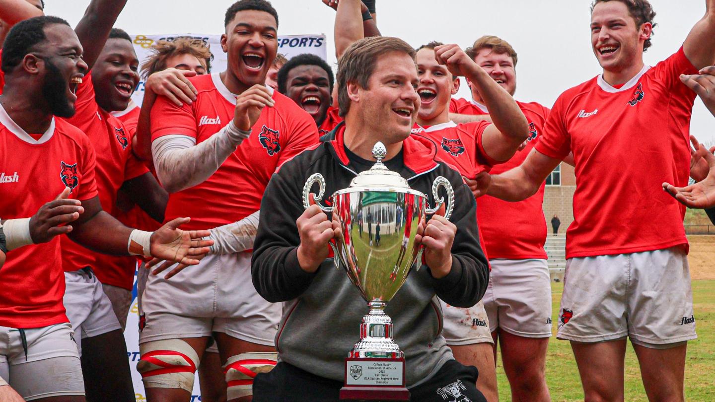 Dominic Shaw hoists the Spartan Regiment Bowl trophy in 2025. Photo Calder Cahill.