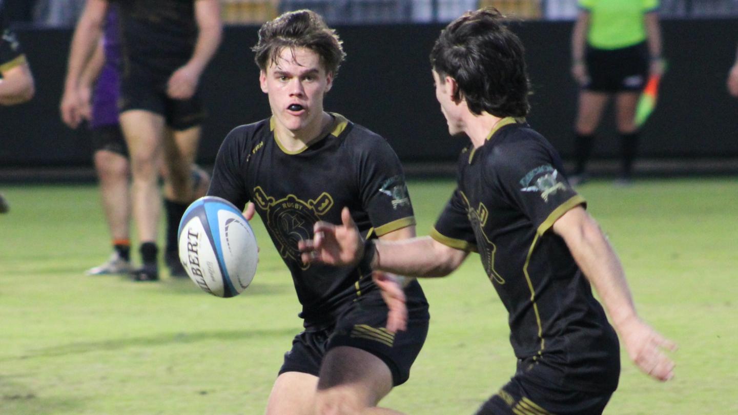 Franciscan moves the ball against Holy Cross. Photo Alex Goff.