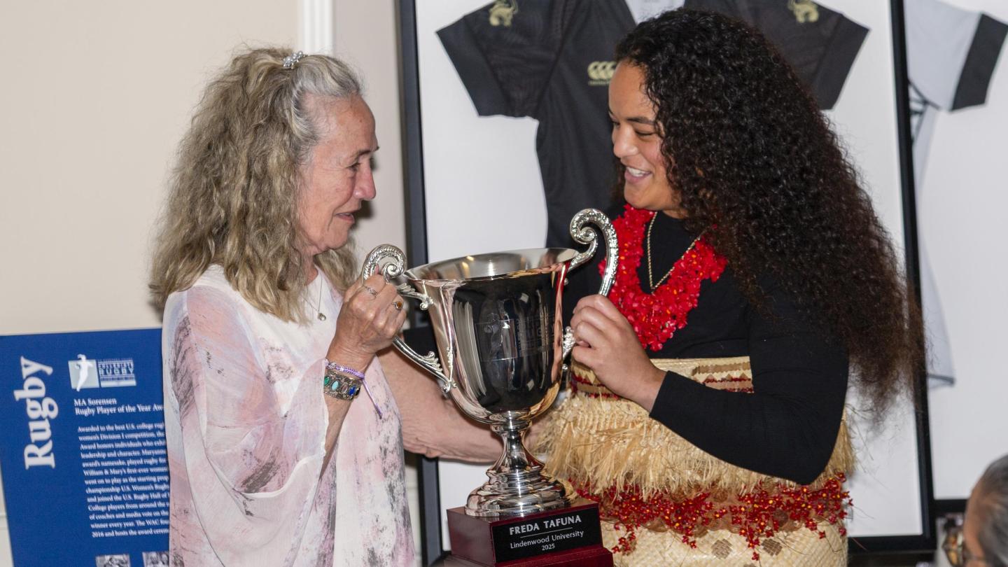 MA Sorensen presents the award named after her to Freda Tafuna at the 2025 WAC Awards dinner in Seattle, Wash. Photo Quinn Toomey.
