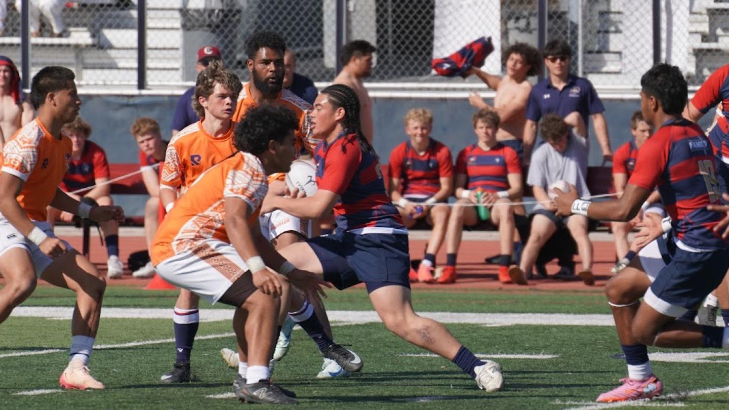 Lauaki Su'a carries ahead for Herriman. Photo Rick Hales.