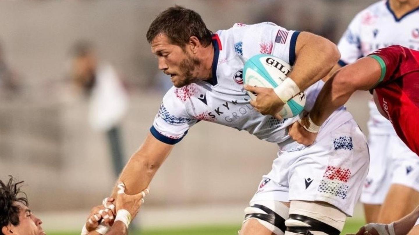 USA captain Jason Damm gets some attention from the Portuguese defense.