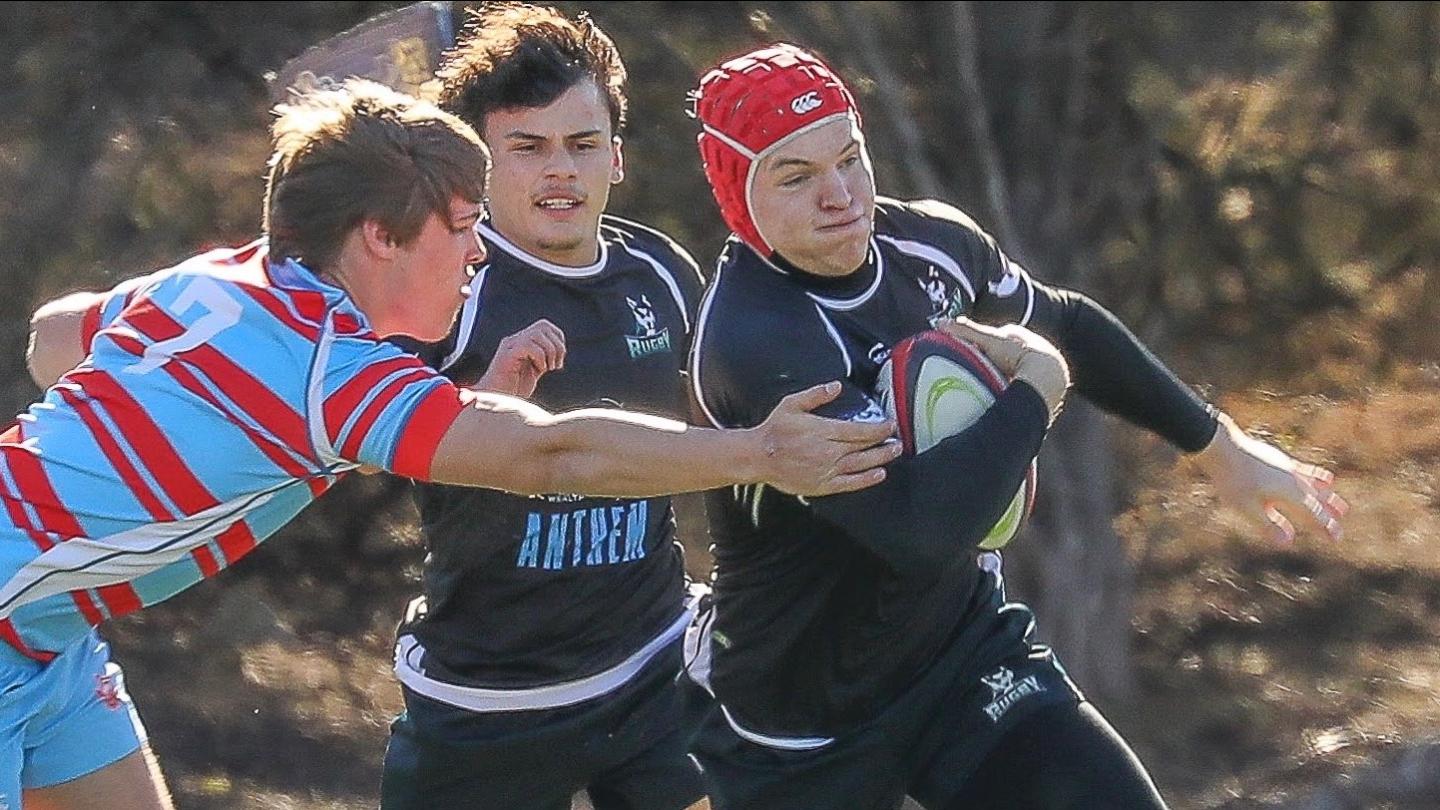 Kai Campbell charges ahead for Huskies.