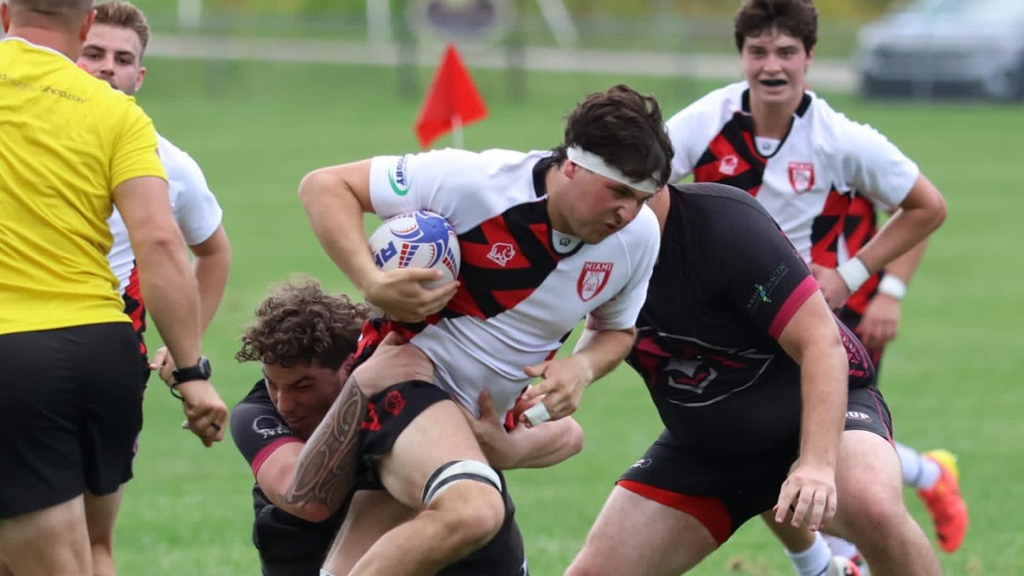 Oliver Seitchik charges through contact for Miami. Photo Kaileigh Hennard.