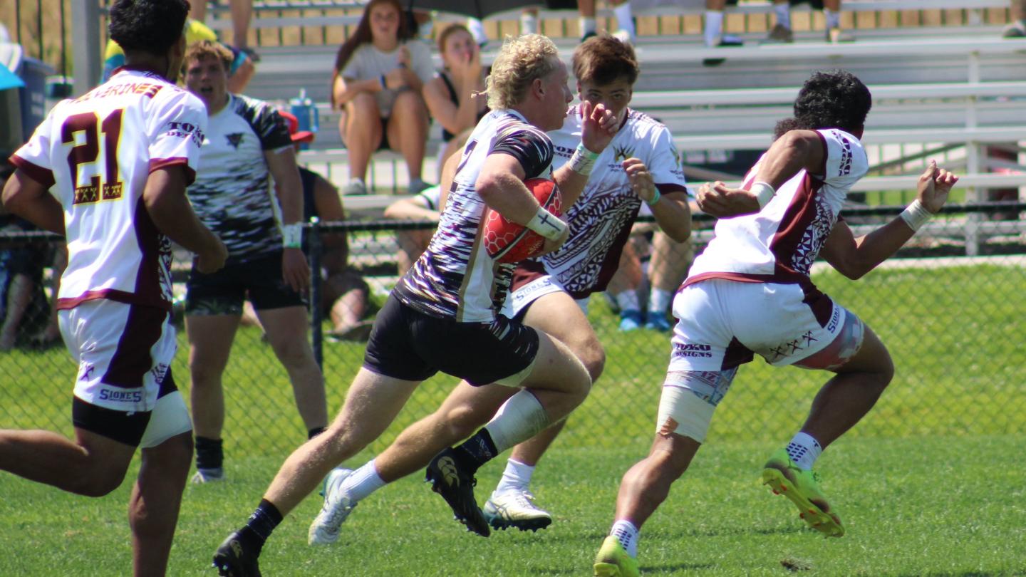Blake Guthrie goes in for the game-winner for Rebel at the NAI 7s. Photo Alex Goff