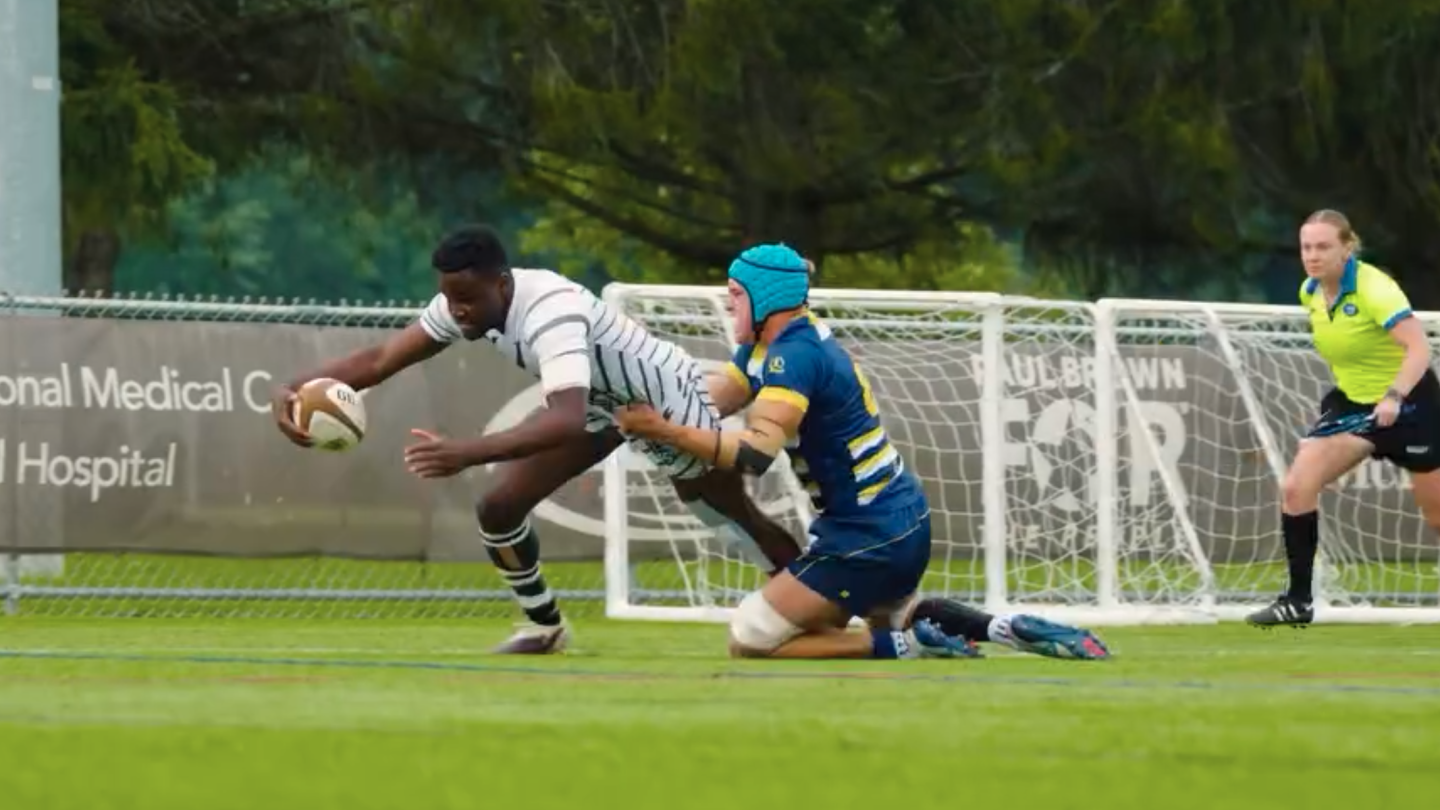 Bonnies wing Dara Falope goes in for a try against Marian.