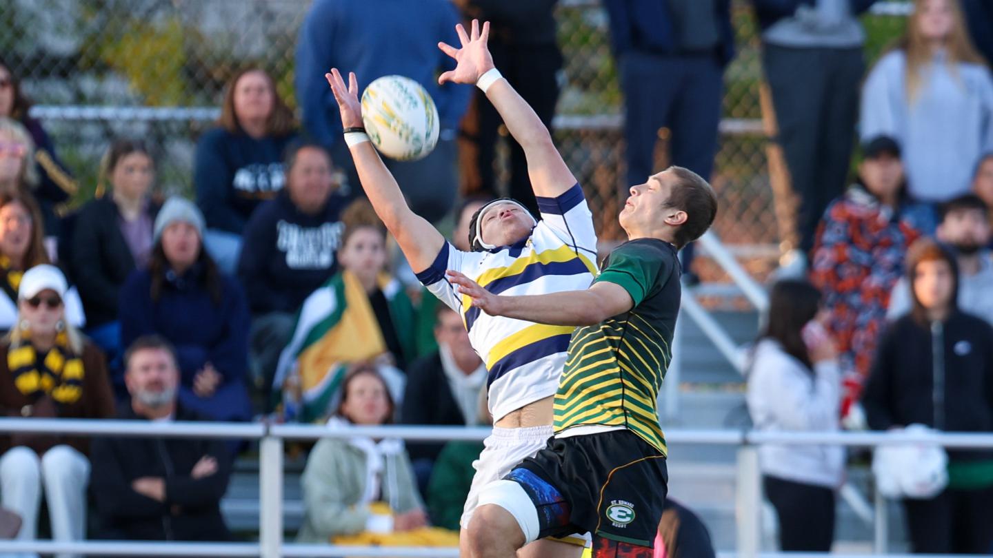 Ed's and Iggy going up for the high ball. Jack Nece photo.